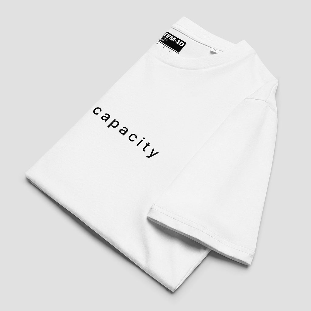 White sweatshirt with 'capacity' text on a light gray background
